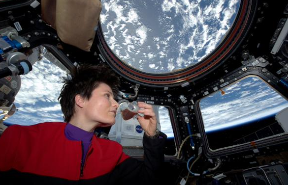 Astro Sam w new espresso machine's first cuppa java May2015.png